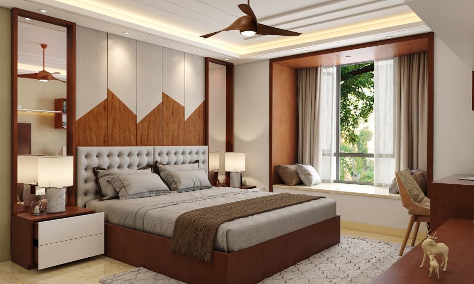 A Brown And White Bedroom With A Sleek Dresser And TV Unit